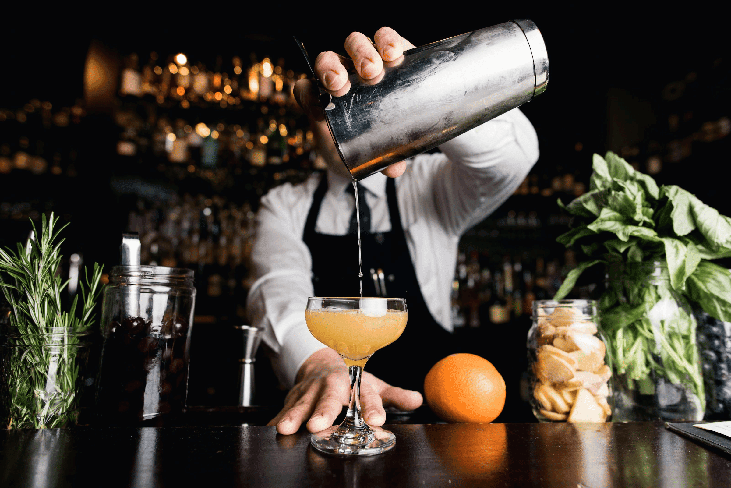A bartender poring a cocktail at Flo at Black Desert Resort