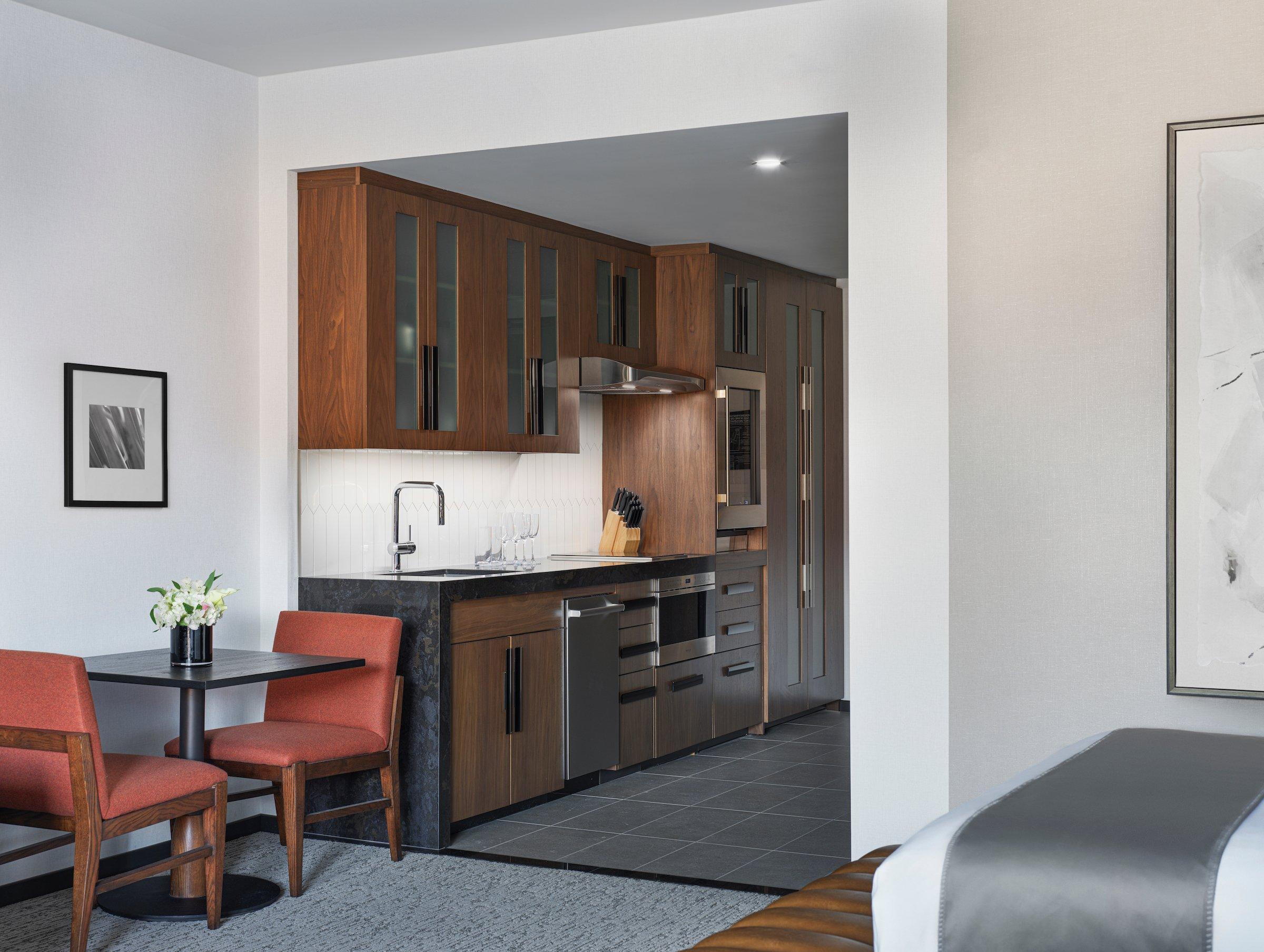 Kitchen and dining area in a 2 bedroom suite at Black Desert Resort