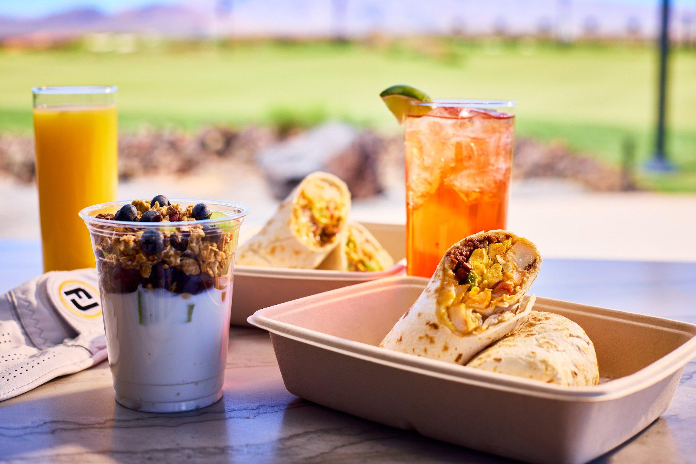 Breakfast burrito, yogurt and granola at Club 73 