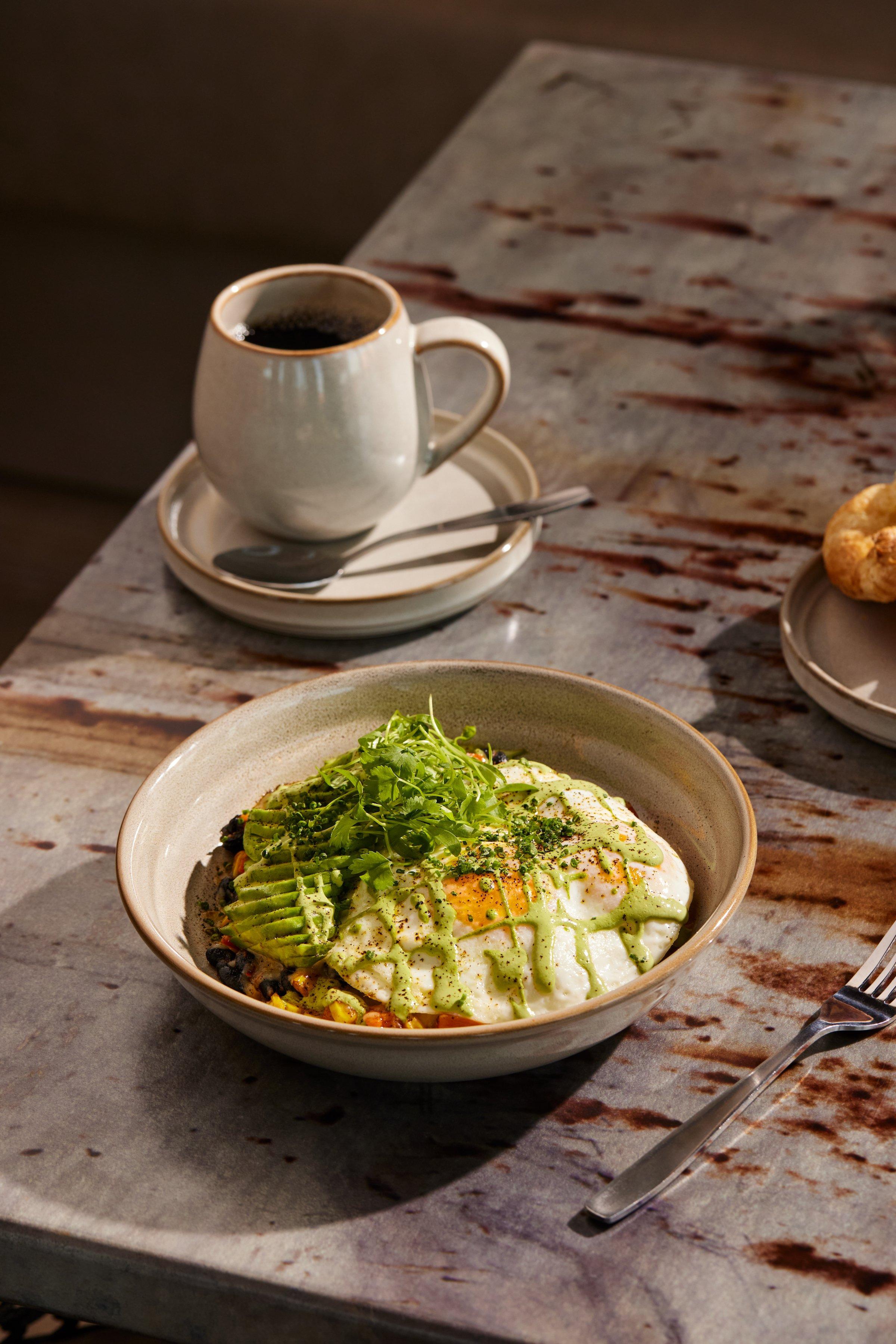 A breakfast dish with a coffee at Latitude restaurant