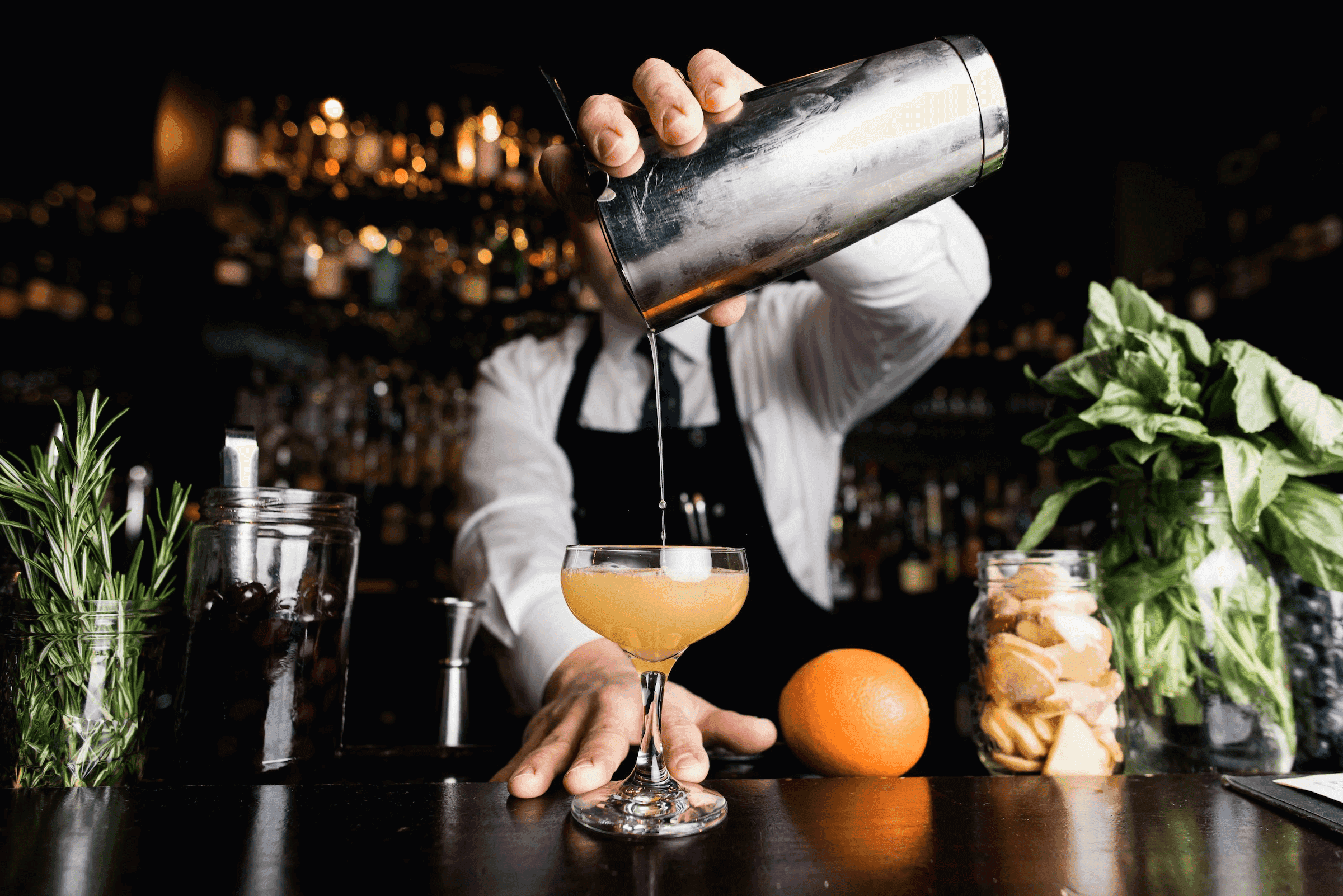 A bartender poring a cocktail at Flo at Black Desert Resort
