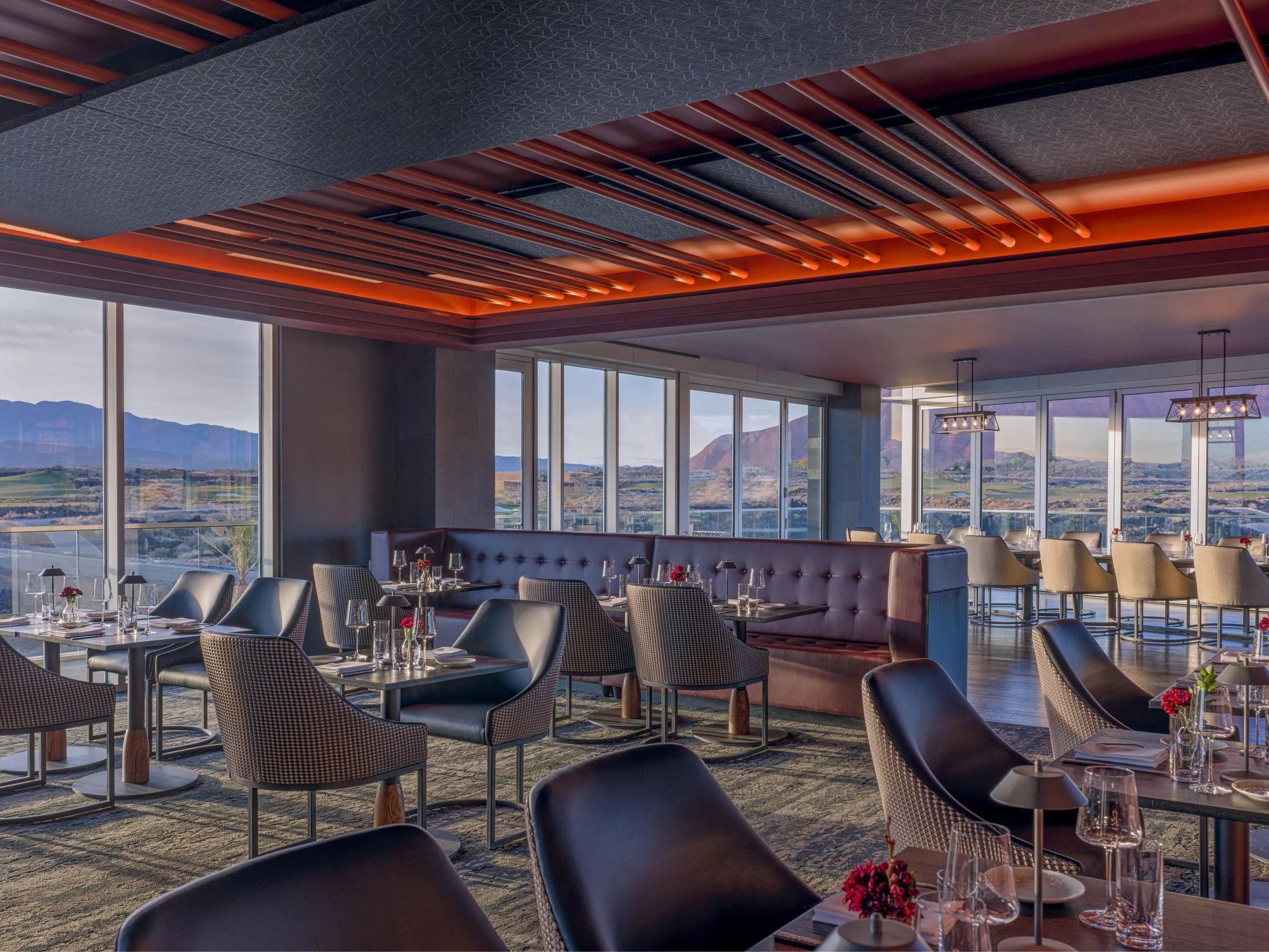 The interior of Basalt with tables set up for service at Black Desert Resort