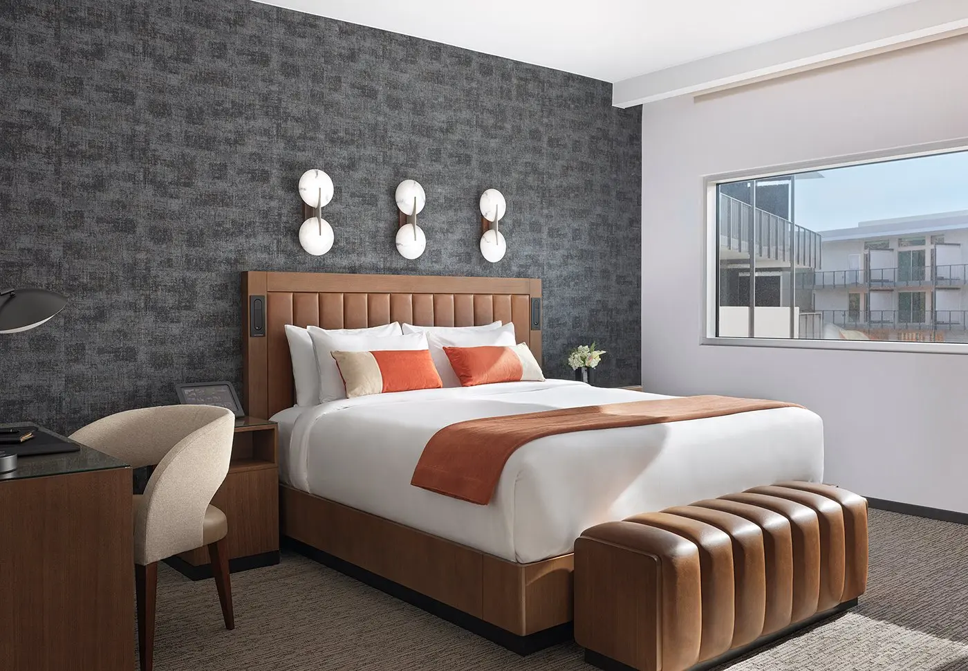 A room with a king bed in a one bedroom suite at Black Desert Resort