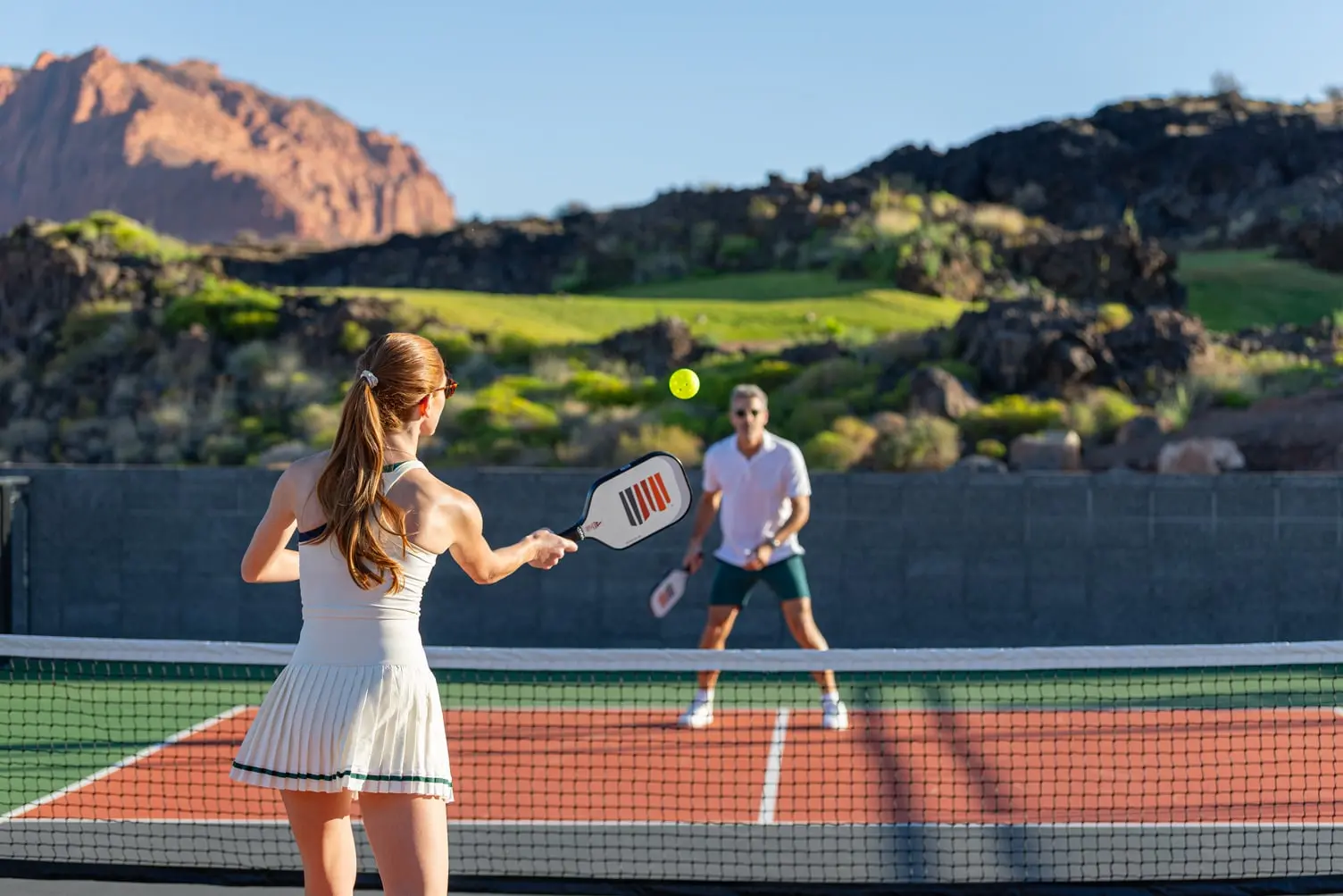 pickleball action shot- couple